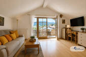 Wohnbereich - Charmante 3-Zimmer-Dachgeschosswohnung mit Panoramablick in Bernau am Chiemsee