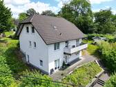 Außenansicht vom Wohnhaus - Preiswertes Einfamilienhaus mit Einliegerwohnung in Top-Lage!