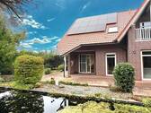 Terrasse mit Schwimmteich - 