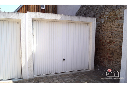 Die Garage ist bereits im Kaufpreis enthalten. - Etagenwohnung mit 80,00 m² in Volkach zum Kaufen