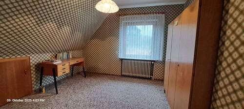 Zimmer im Dachgeschoss - 