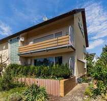 Vollvermietetes, gepflegtes 3-Familienhaus mit Tageslichtbädern, Garage und Garten in guter Wohnlage - Rüsselsheim