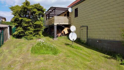 Rückansicht mit Balkon - 