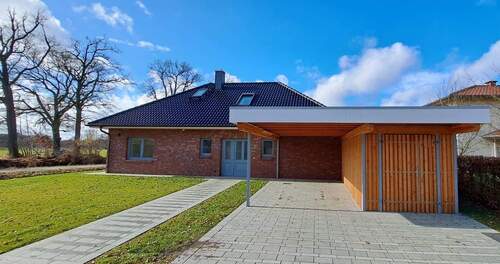 Haus und Garten - Einfamilien-Winkelbungalow in Wiegersen Neubau – Erstbezug