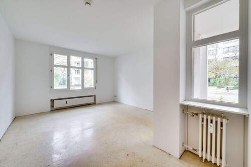 Wohnzimmer - 2 Zimmer Etagenwohnung in München