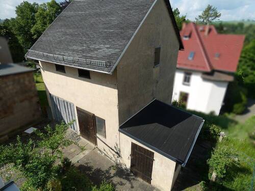 Ansicht Nebengebäude mit innenliegender Garage - 