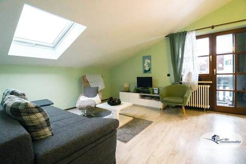 Wohnzimmer - 3 Zimmer Etagenwohnung zum Kaufen in Aschau im Chiemgau / Hintergschwendt