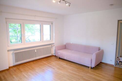 Wohnzimmer - 2 Zimmer Etagenwohnung in Freiburg
