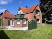 Rück-und Seitenansicht Haus - Einfamilienhaus mit 111,00 m² in Schenefeld zum Kaufen