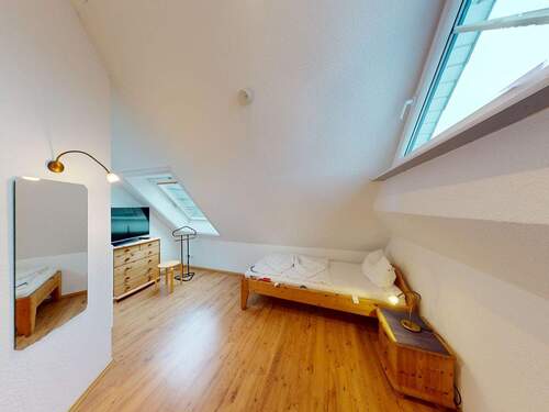 Schlafzimmer 3 im Spitzboden - 4 Zimmer Etagenwohnung zum Kaufen in Ostseeheilbad Zingst