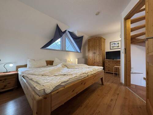 Schlafzimmer 1 im Dachgeschoss - 