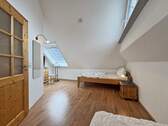 Schlafzimmer 3 im Spitzboden - 