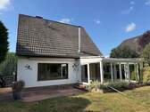 Rückseite mit Wintergarten - Einfamilienhaus mit 159,00 m&sup2; in Mönchengladbach zum Kaufen