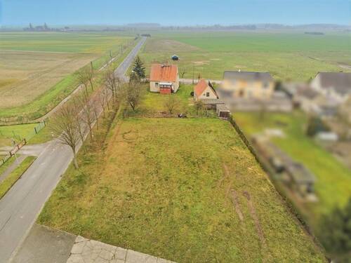 Luftansicht - Idyllisches Einfamilienhaus mit großem Grundstück!