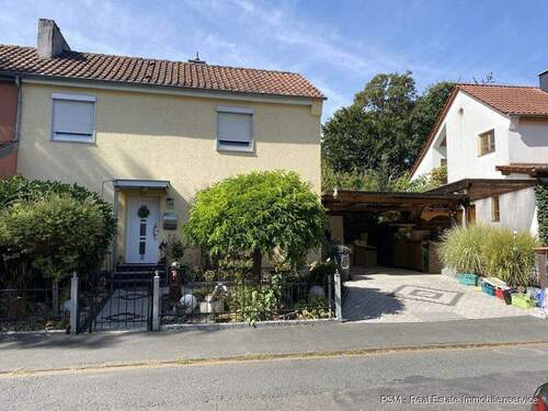 Ansicht Front - Attraktives Immobilienangebot Reiheneckhaus mit großem Grundstück und Ausbaupotenzial