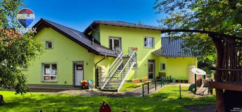 Gartenansicht - Mehrfamilienhaus, Wohnhaus zum Kaufen in Petershagen/Eggersdorf