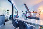 ...vereint Wohn- und Essbereich auf einer Etage. - 