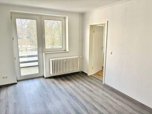 Wohnzimmer - Frühlingsaktion: 2 Nettokaltmieten frei! Hübsche 2-Zimmer-Wohnung mit Balkon in ruhiger Lage