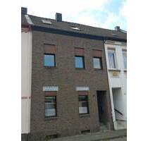 Einfamilienreihenhaus mit Anbau, Keller und Garten in verkehrsgünstiger Vorstadtlage - Jüchen Hochneukirch