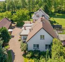 Einfamilienhaus, zwei Wohnungen und fantastisches Grundstück in Kolkwitz OT Babow - Am Kanal!