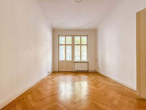 Wohnzimmer - Charmante 4-Zimmer Altbauwohnung nahe Olivaer Platz