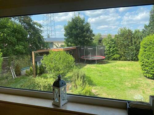 Blick in den Garten - Einfamilienhaus mit 180,00 m² in Ludwigslust zum Kaufen