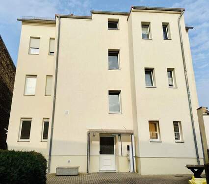 Hofseite - 1 Zimmer Mehrfamilienhaus, Wohnhaus zum Kaufen in Delitzsch