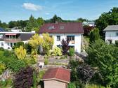Rückansicht - Einfamilienhaus mit liebevoll gestaltetem Gartenparadies und Ausbaupotenzial im Dachgeschoss - mit toller Fernsicht in Bad Emstal-Sand