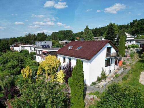 Rückansicht mit Garten - Einfamilienhaus mit 149,00 m² in Bad Emstal zum Kaufen