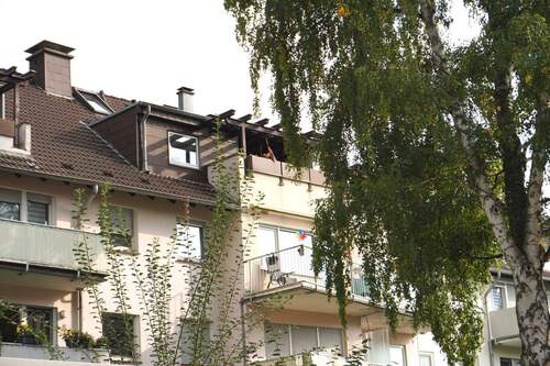 Rückansicht Wohnhaus - 1 Zimmer Etagenwohnung zum Kaufen in Leverkusen