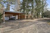 Carport mit Boot und Schuppen - 