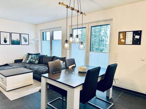 Der Wohnbereich mit Zugang zur Sonnenterrasse - Terrassenwohnung mit 123,60 m&sup2; in Wittlich zur Miete