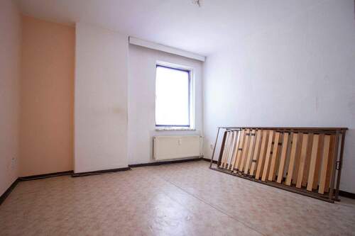 Schlafzimmer 1 DG Wohnung - 