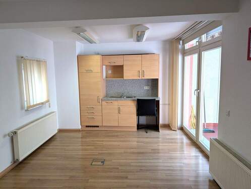 Zimmer mit Küchenzeile im OG 1 - 