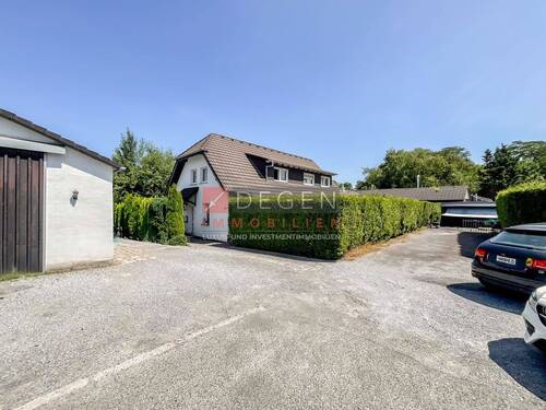 &-Familienhaus mit Halle 1 Garage + 7 Außenstellplätze - RESERVIERT! 6-Familienhaus + ca. 200?m² Werkstatt, Garage & 9 Stellplätze-Unna City