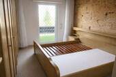 1.OG. Schlafzimmer mit Balkon - 