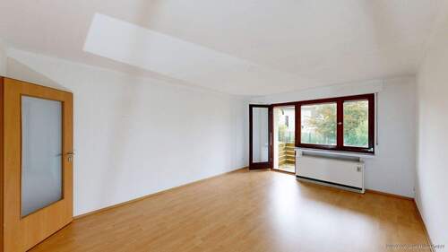 Wohnzimmer mit Zugang zum Balkon - 3 Zimmer Etagenwohnung in Hamm