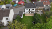 Vogelperspektive Rückansicht - Einfamilienhaus mit 130,00 m&sup2; in Kleinblittersdorf zum Kaufen
