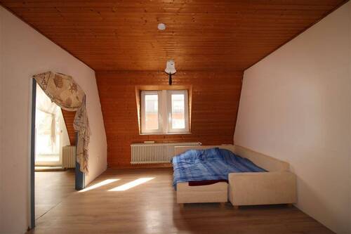 Wohnzimmer - Etagenwohnung in Wilhelmshaven zum Kaufen