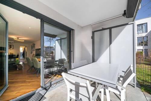 Südterrasse - Familienfreundlichen 4-Zimmer-Erdgeschosswohnung mit Südgarten und zwei TG-Einzelstellplätzen!