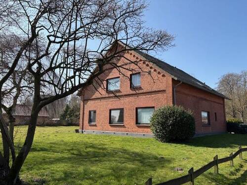 Außenansicht Rückseite - Großzügige, helle 5-Zi.-Wohnung in Syke-Gessel