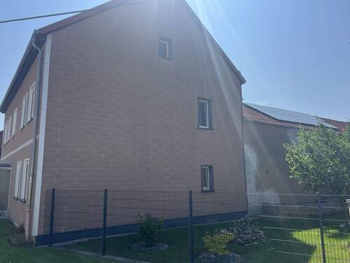 Seitenansicht - Einfamilienhaus mit 238,00 m² in Urleben zum Kaufen