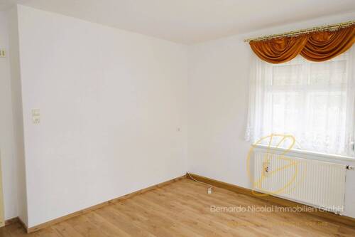 Schlafzimmer Wohnung im Erdgeschoss - 