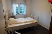 Schlafzimmer mit Fenster - 