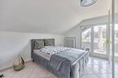 Gemütliches Schlafzimmer mit Loggia Dachgeschoss - 