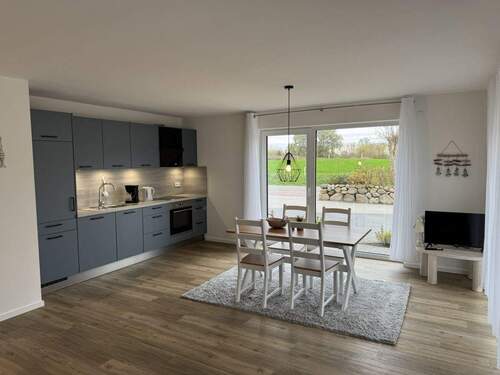 offene Wohnküche mit Essbereich - Etagenwohnung mit 67,00 m&sup2; in Norddeich zur Miete