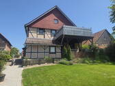 Hausansicht aus Richtung Weser - PROVISIONSFREI - Charmantes Zweifamilienhaus mit traumhaften Ausblick und vielseitigem Grundstück