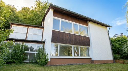 Hausansicht Garten - Einfamilienhaus mit Wintergarten auf ca. 1.016 m² Grundstück