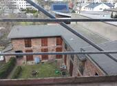 Hofansicht (Gerüst wegen Fassadengestaltung) - 5 Zimmer Etagenwohnung in Neubrandenburg