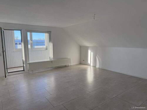 Wohnzimmer - 4-Zimmer-Maisonettewohnung im Zentrum von Bad Zwischenahn